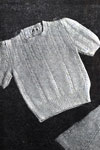 girls sweater with drawn cables pattern